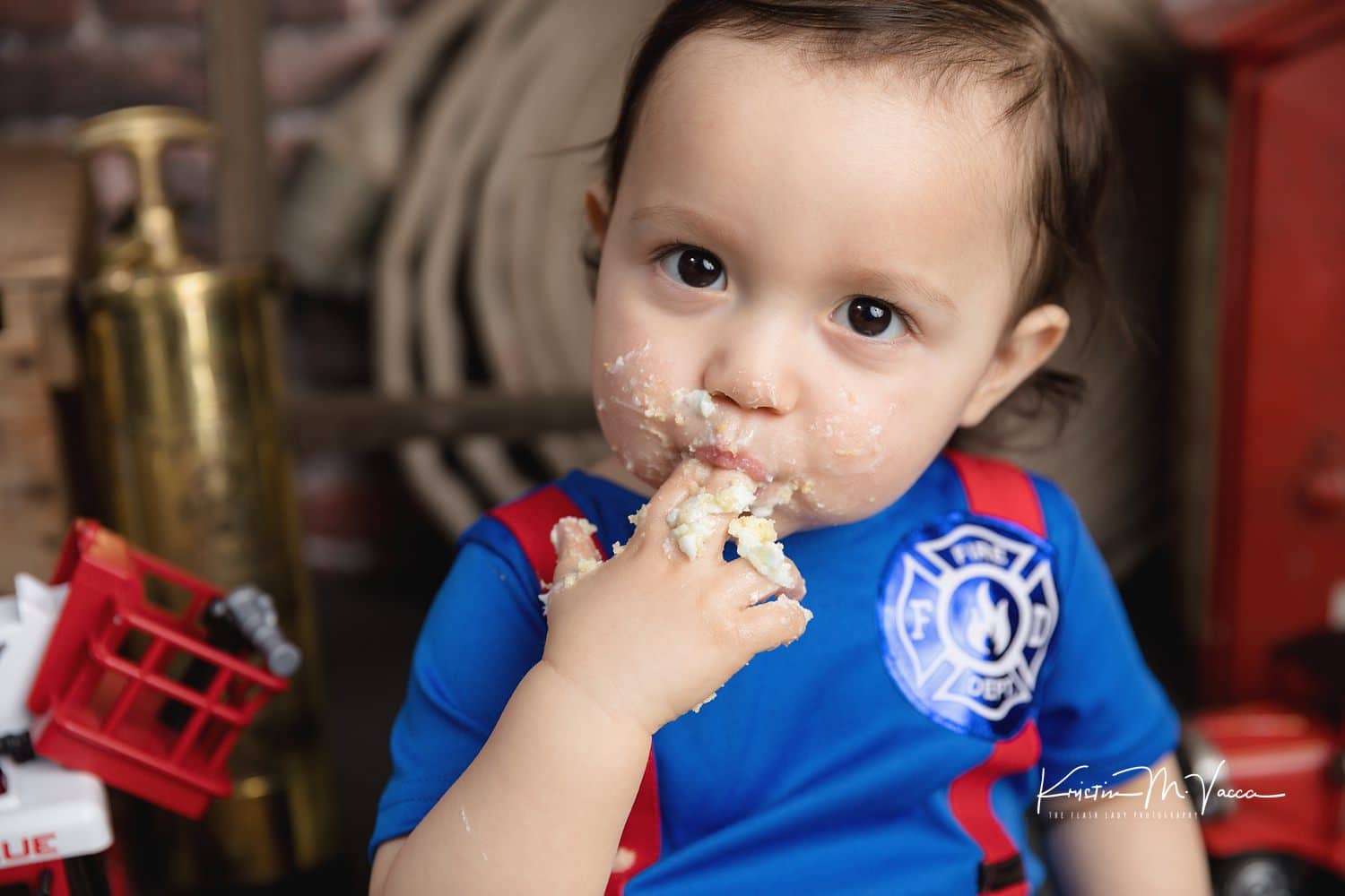 Images from our firefighter cake smash with Aiden by Wethersfield, CT photographer The Flash Lady Photography