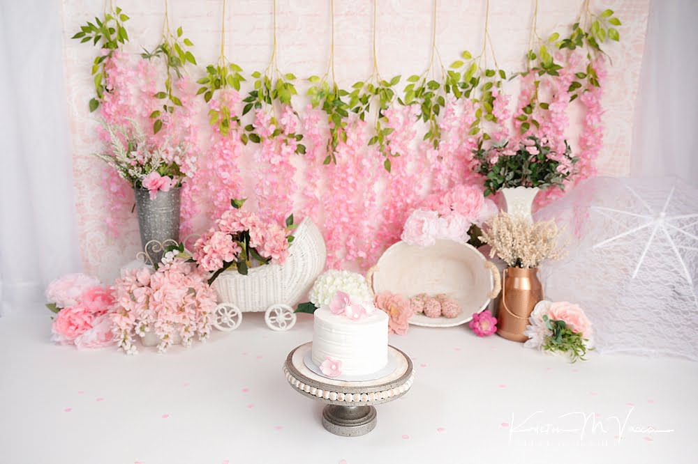 Pink floral smash of cake by The Flash Lady Photography