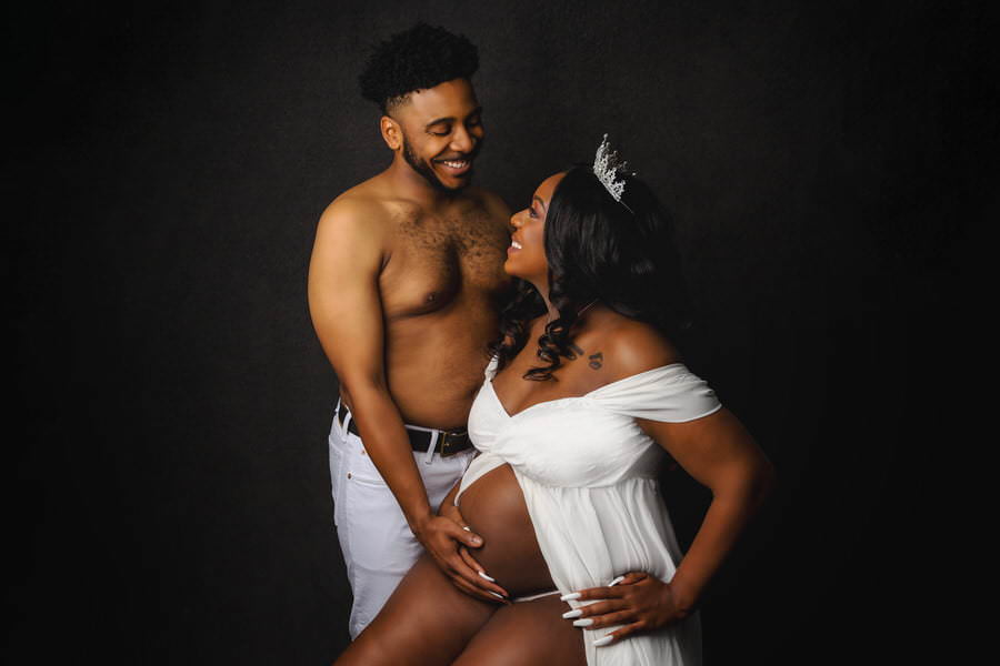 Beautiful maternity photography of a husband and wife posing together