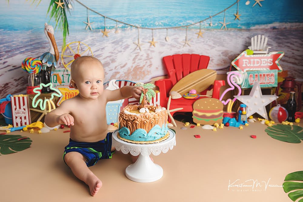 Seaside carnival cake smash by The Flash Lady Photography