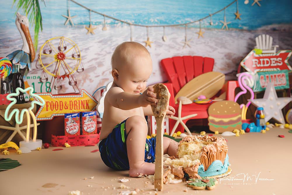 Seaside carnival cake smash by The Flash Lady Photography